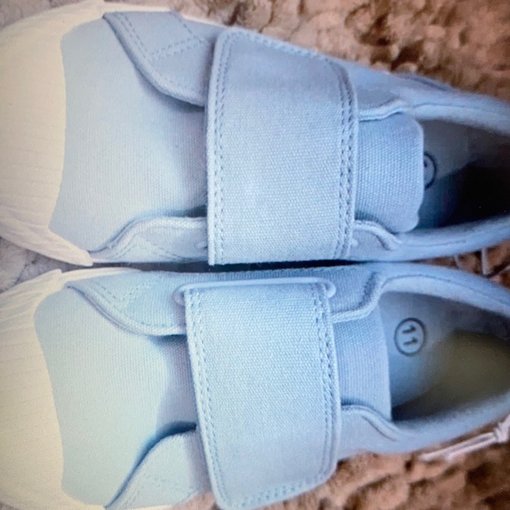Canvas slip-on adjustable strap reinforced toe shoes